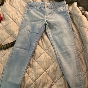 Light washed jeans. Never worn. Small ink mark on front.